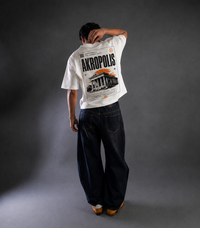 9ELIXIR Akropolis oversized tee — orange temple graphic on cream heavyweight cotton, detail view