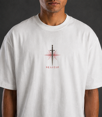 9ELIXIR Fortitudo oversized tee — marble bust and orange line on off-white cotton, detail view